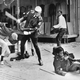 A police officer beats a youth during the violence that erupted during the 1968 Memphis Sanitation Strike. Larry Payne, the 16-year-old in the background, was killed by police later in the day. The image was scanned from the book “I Am a Man: Photographs of the 1968 Memphis Sanitation Strike and Dr. Martin Luther King Jr.” The book credits Jack Thornell of the Associated Press.